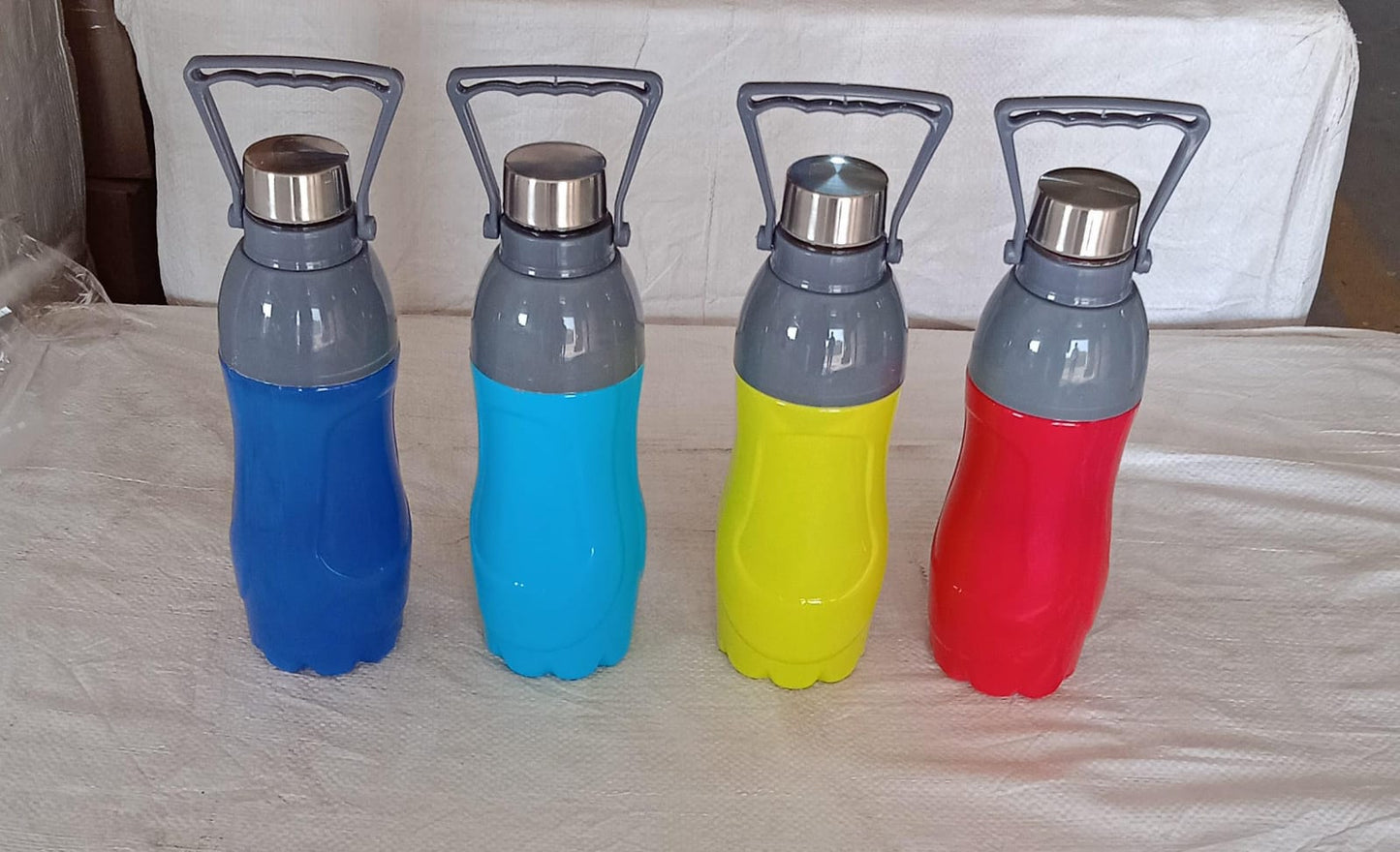 Plastic Sports Bottle (1.8L): Insulated, Leakproof, BPA-Free (Mix Color) - Springkart