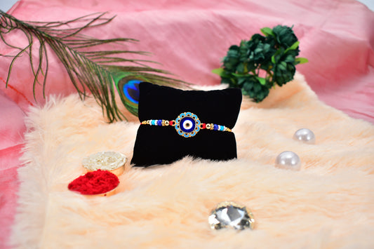 Evil Eye Rakhi With Blue Beads And Golden Accents Protective Nazar Design