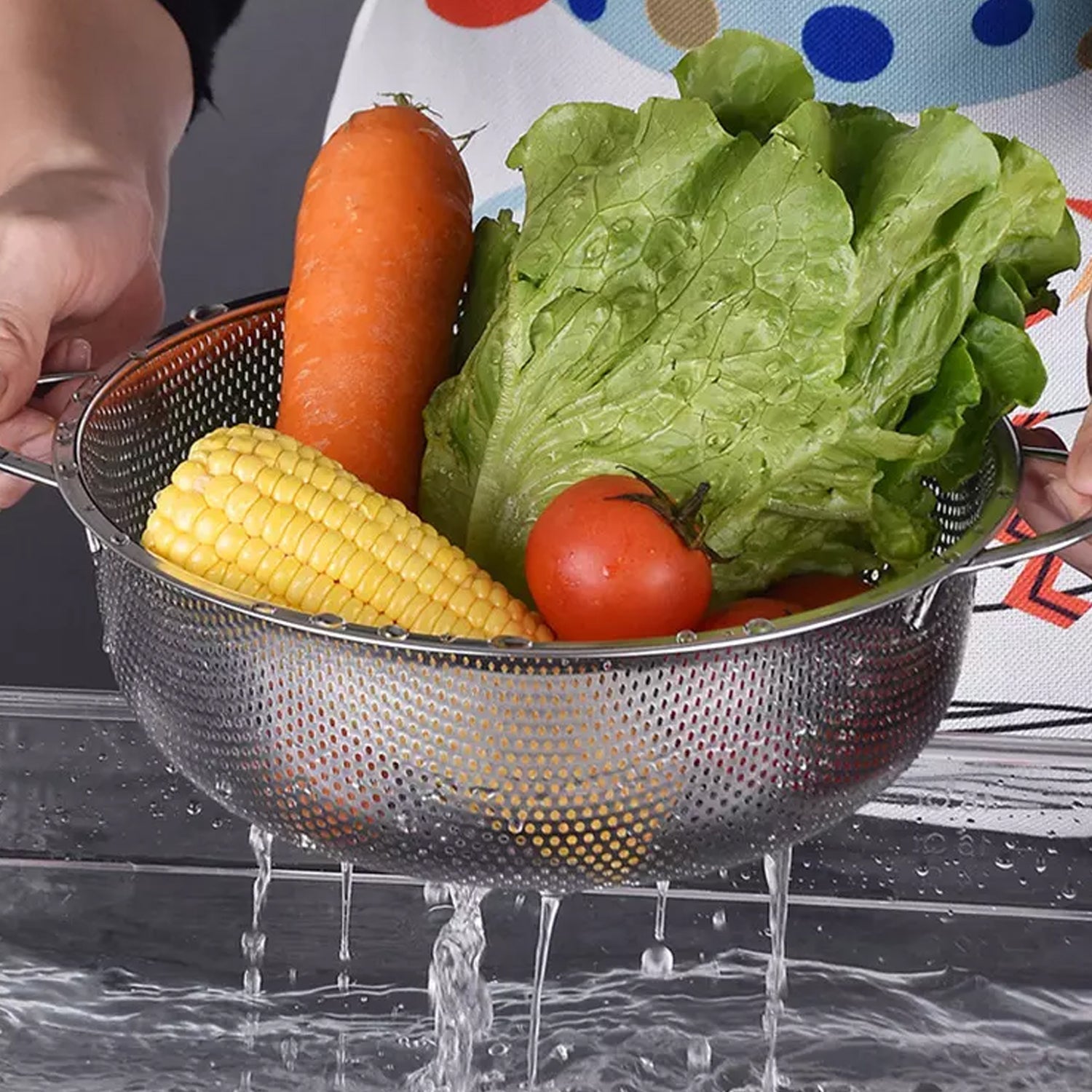 Stainless steel washing bowl with collapsible design.