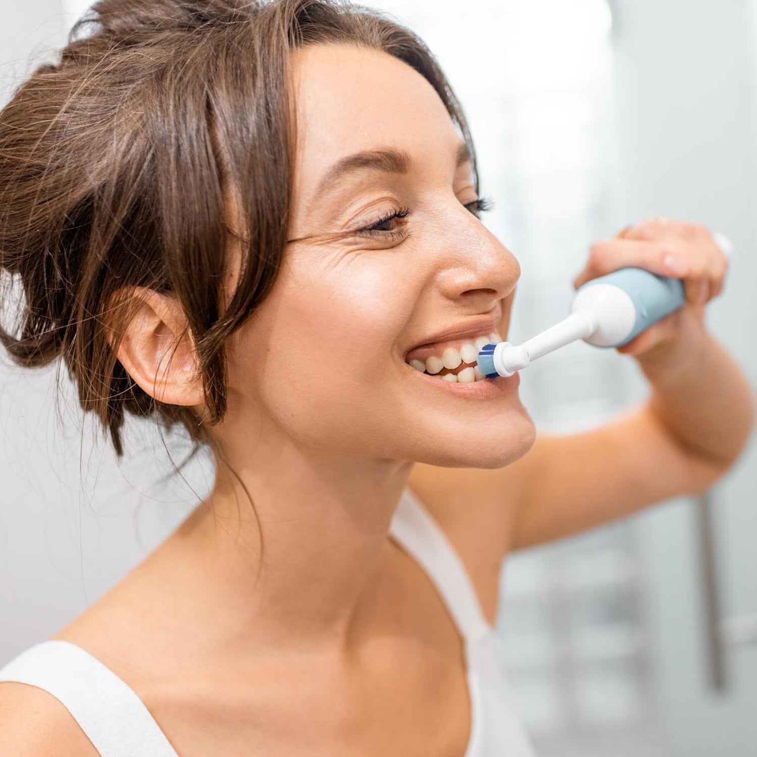 Electric toothbrush with charging base