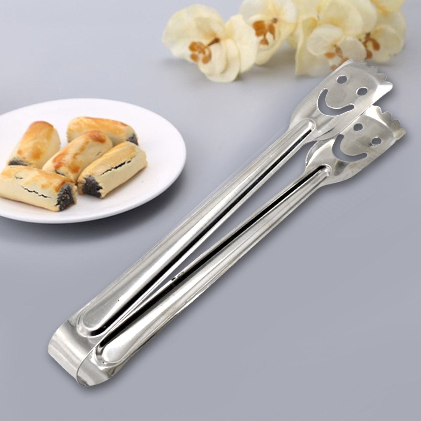 Smiley face stainless steel utility tongs, 1pc, great for cooking and serving.