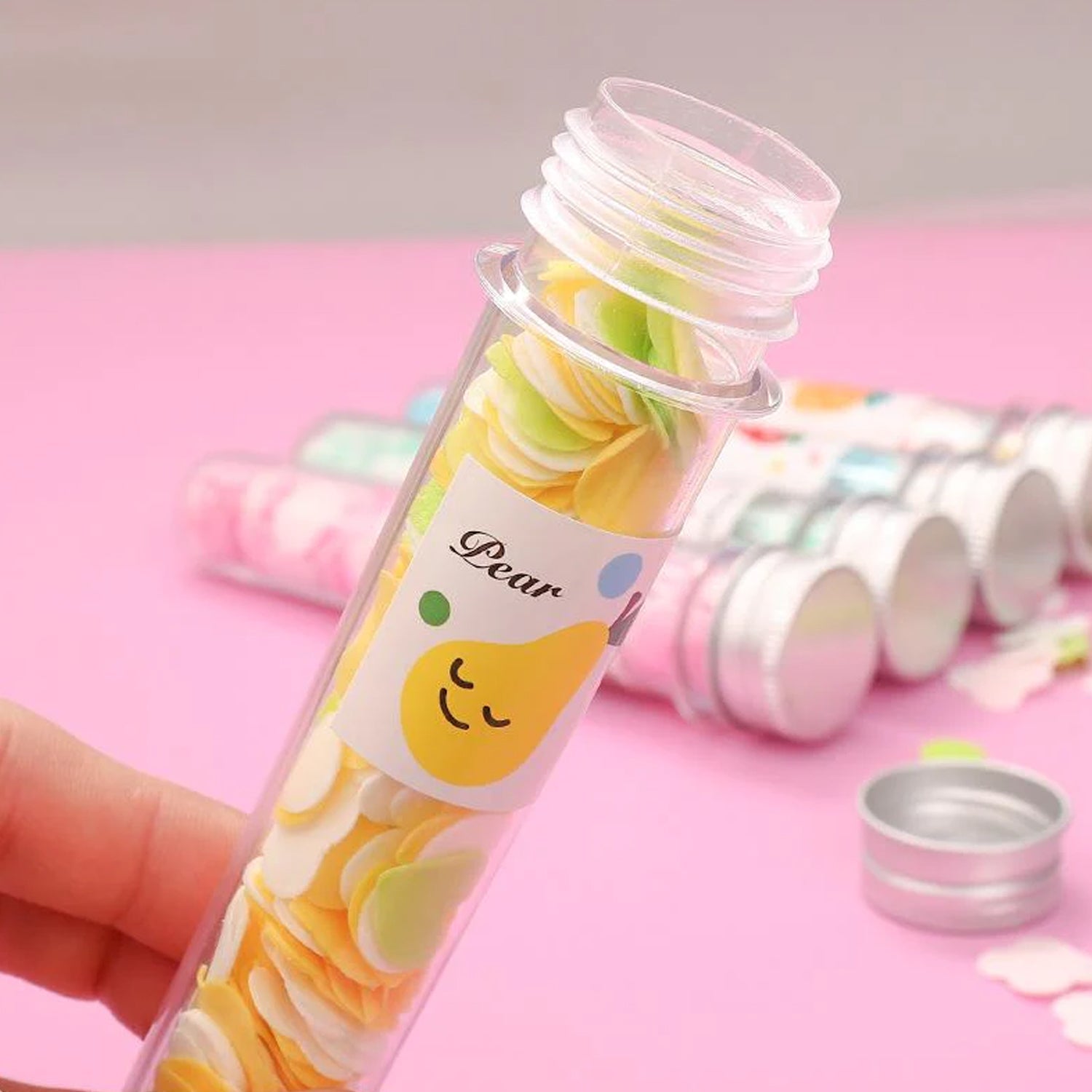 Flower-shaped paper soap strips in a test tube for portable hand washing