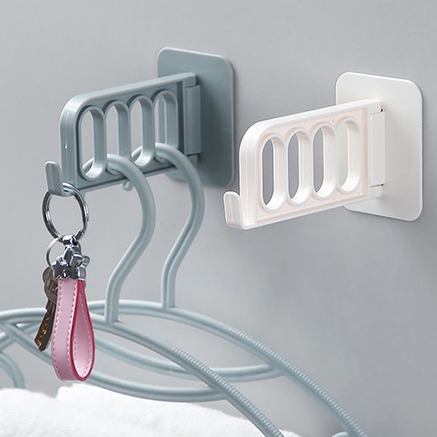 Single door hook for use in bathroom, kitchen, bedroom, or cubicle.