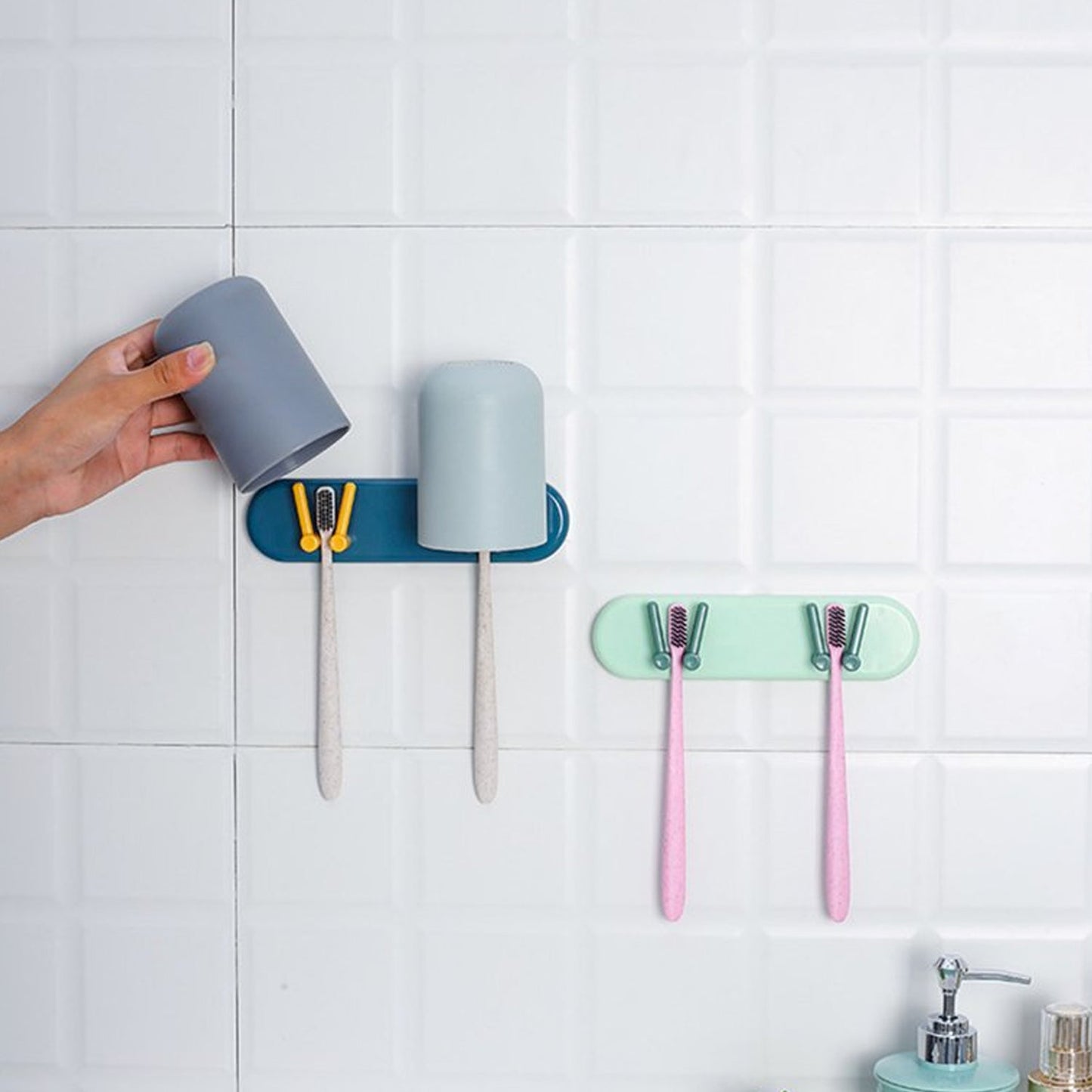 Wall-mounted plastic holder, organizer for bathroom, with shelf and hooks.