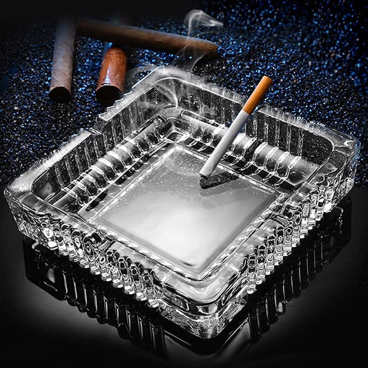 Square crystal ashtray for cigars and cigarettes.