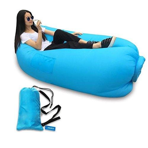 Inflatable camping lounger sofa in outdoor setting