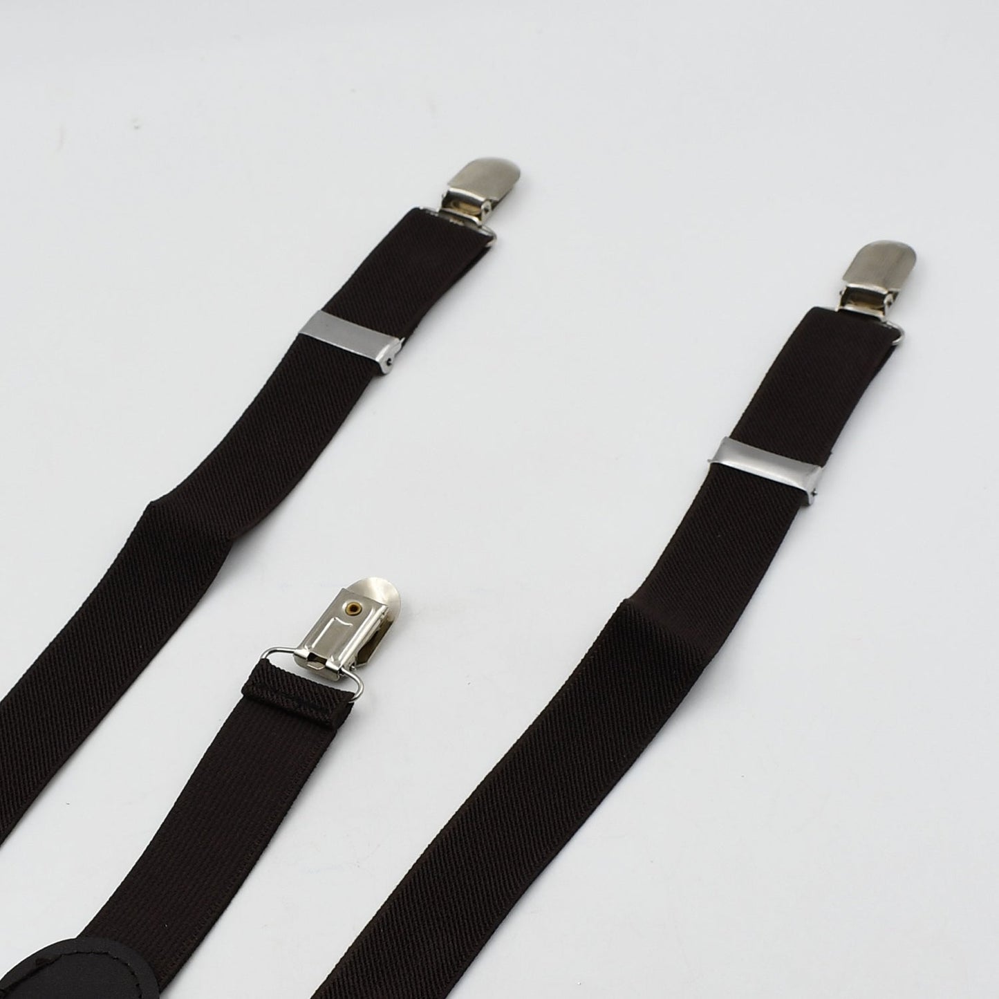 Formal adjustable suspenders with metal clips.