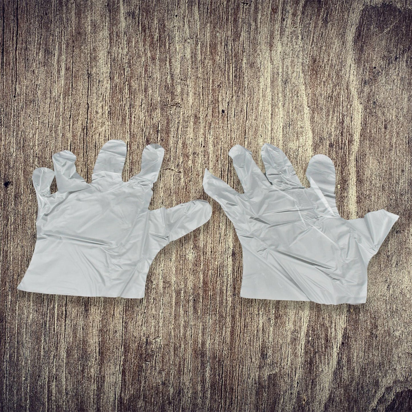 Large Disposable Gloves (100 Pcs): Clear Plastic, Multipurpose - Springkart 