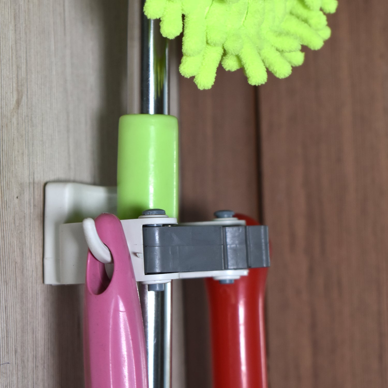 Sleek mop hanger for easy access and tidy storage