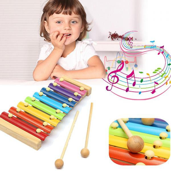 Colorful wooden xylophone with multicolored bars and mallet