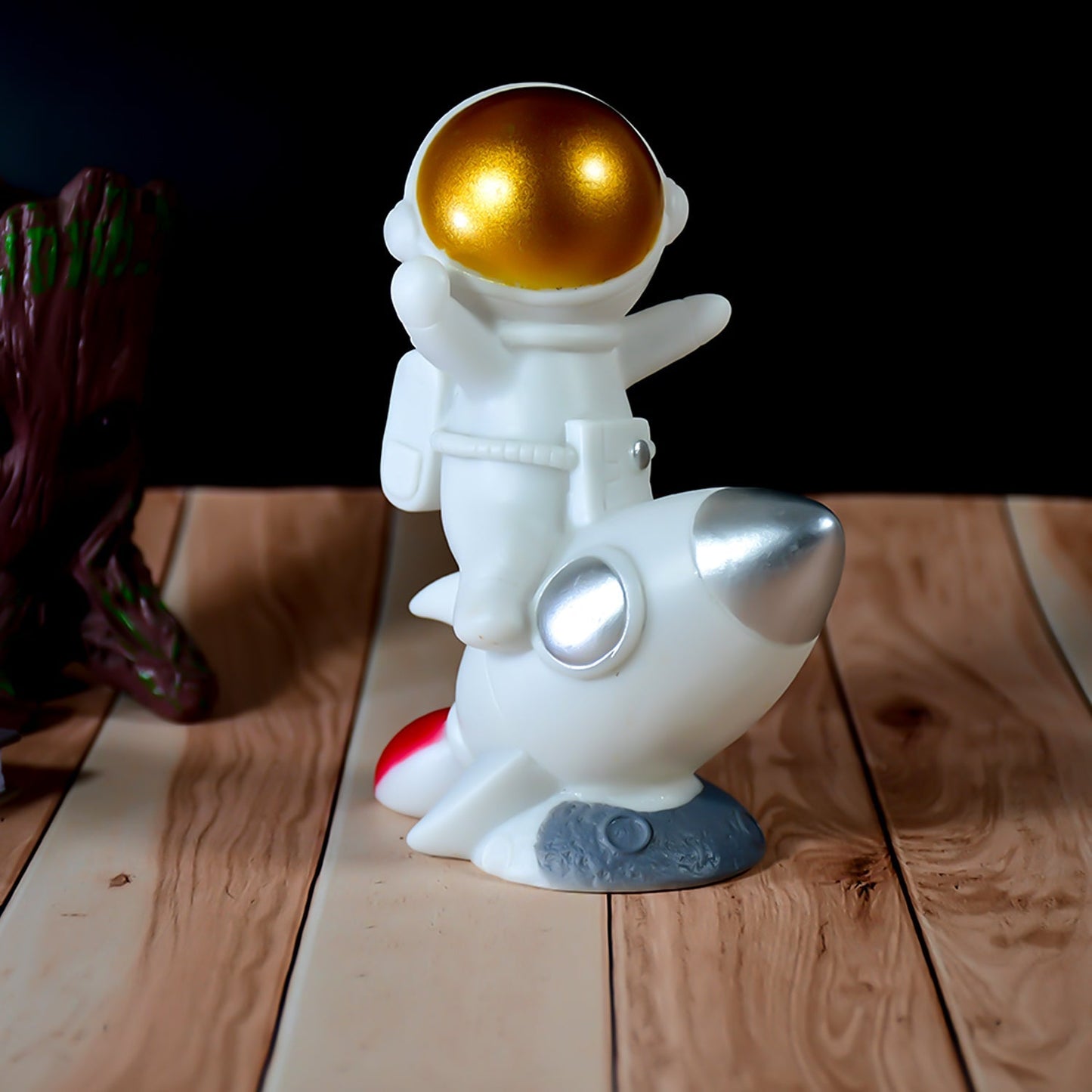 Mini astronaut figurine for home decor.