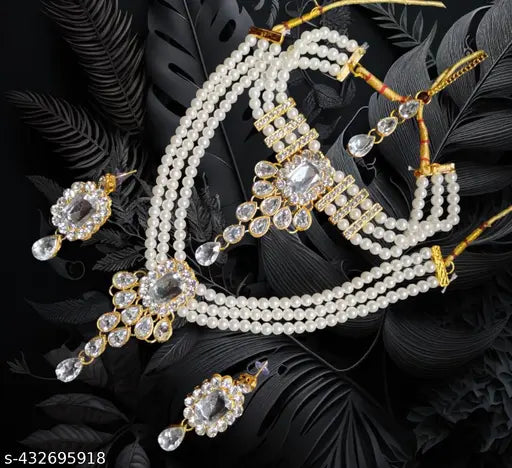 The Stunning Rock combo necklace set with earrings and maang tika