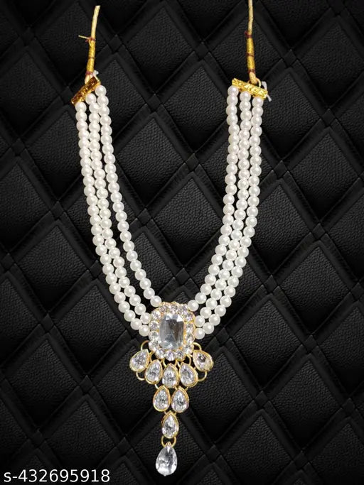 The Stunning Rock combo necklace set with earrings and maang tika