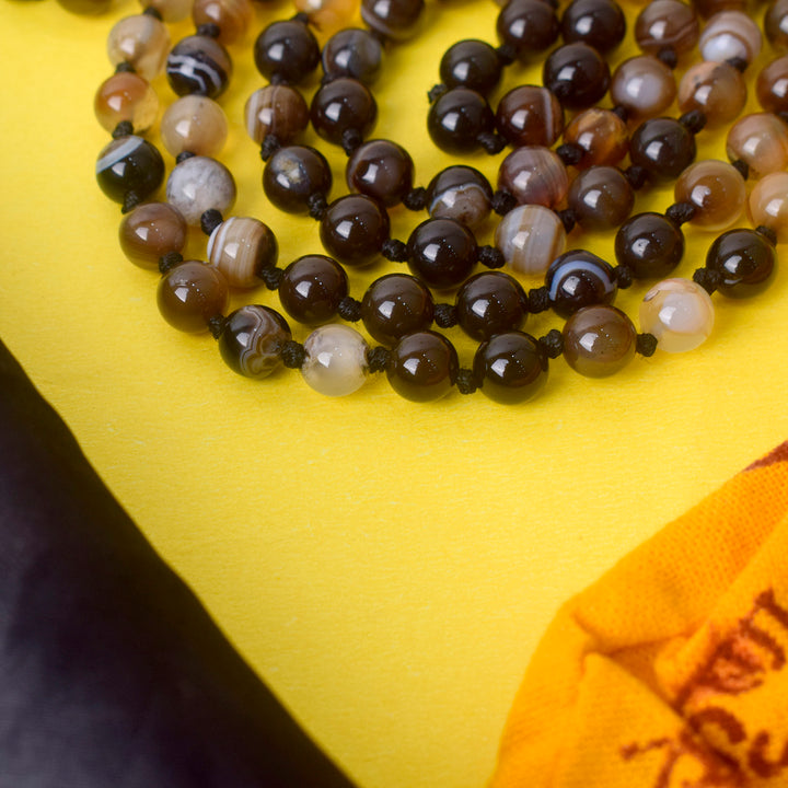 Buy Premium Hakik Jap Mala Crystal Brown & Black | Cosmic Power Mala