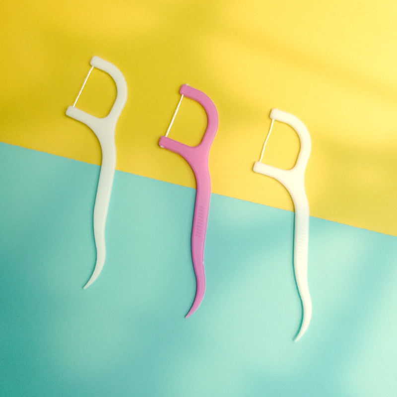 Portable dental floss picks for clean teeth.