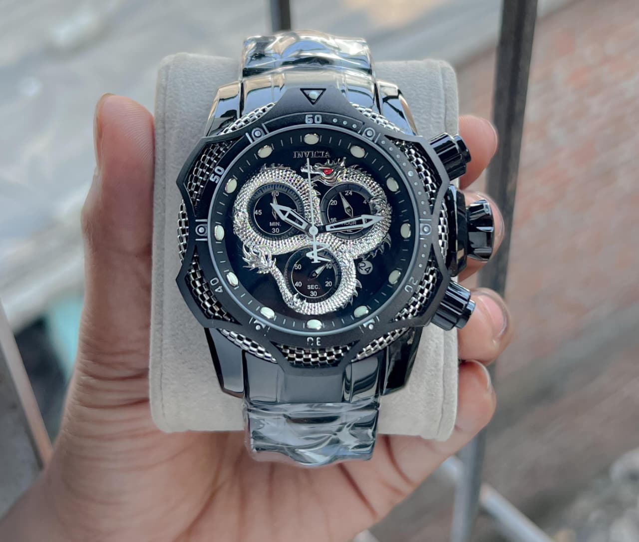 Invicta venome luxury chronograph watch, featuring a striking gold dial with a detailed snake design,