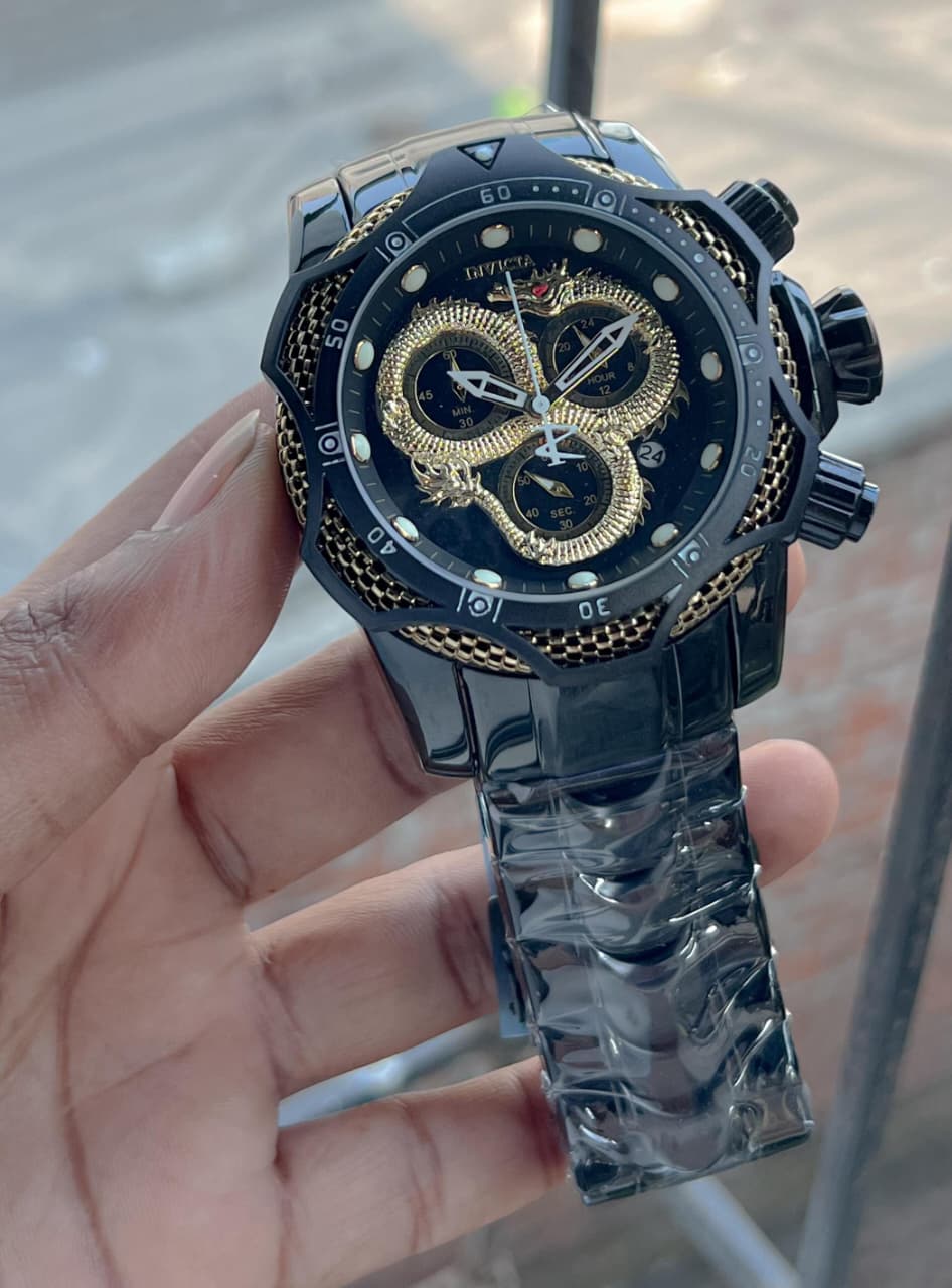 Invicta venome luxury chronograph watch, featuring a striking gold dial with a detailed snake design,