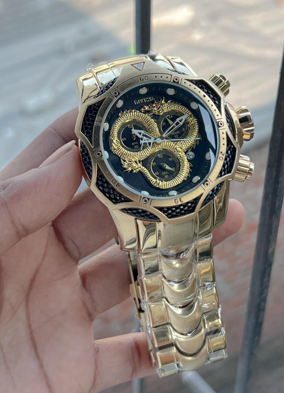 Invicta venome luxury chronograph watch, featuring a striking gold dial with a detailed snake design,
