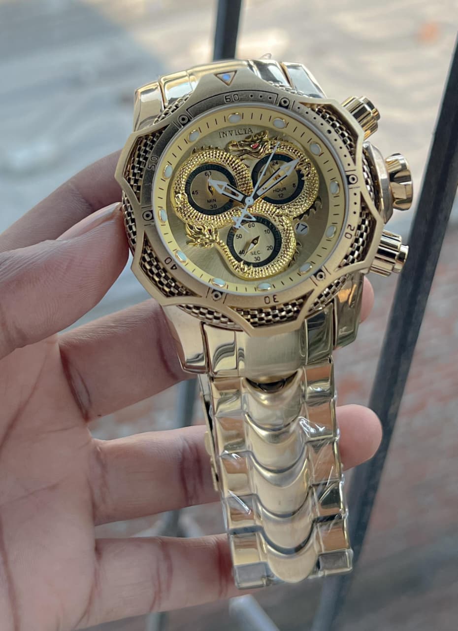 Invicta venome luxury chronograph watch, featuring a striking gold dial with a detailed snake design,