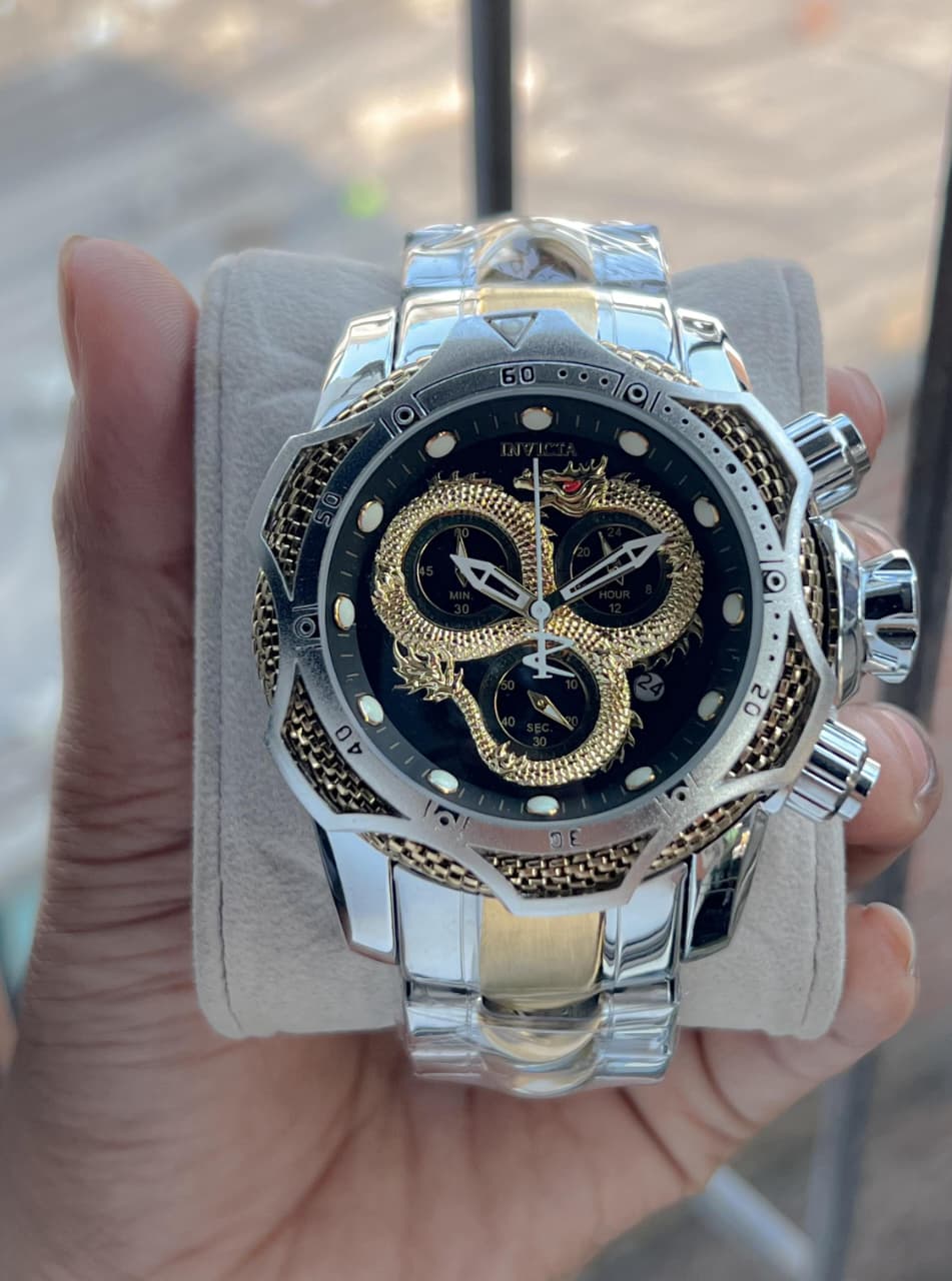 Invicta venome luxury chronograph watch, featuring a striking gold dial with a detailed snake design,
