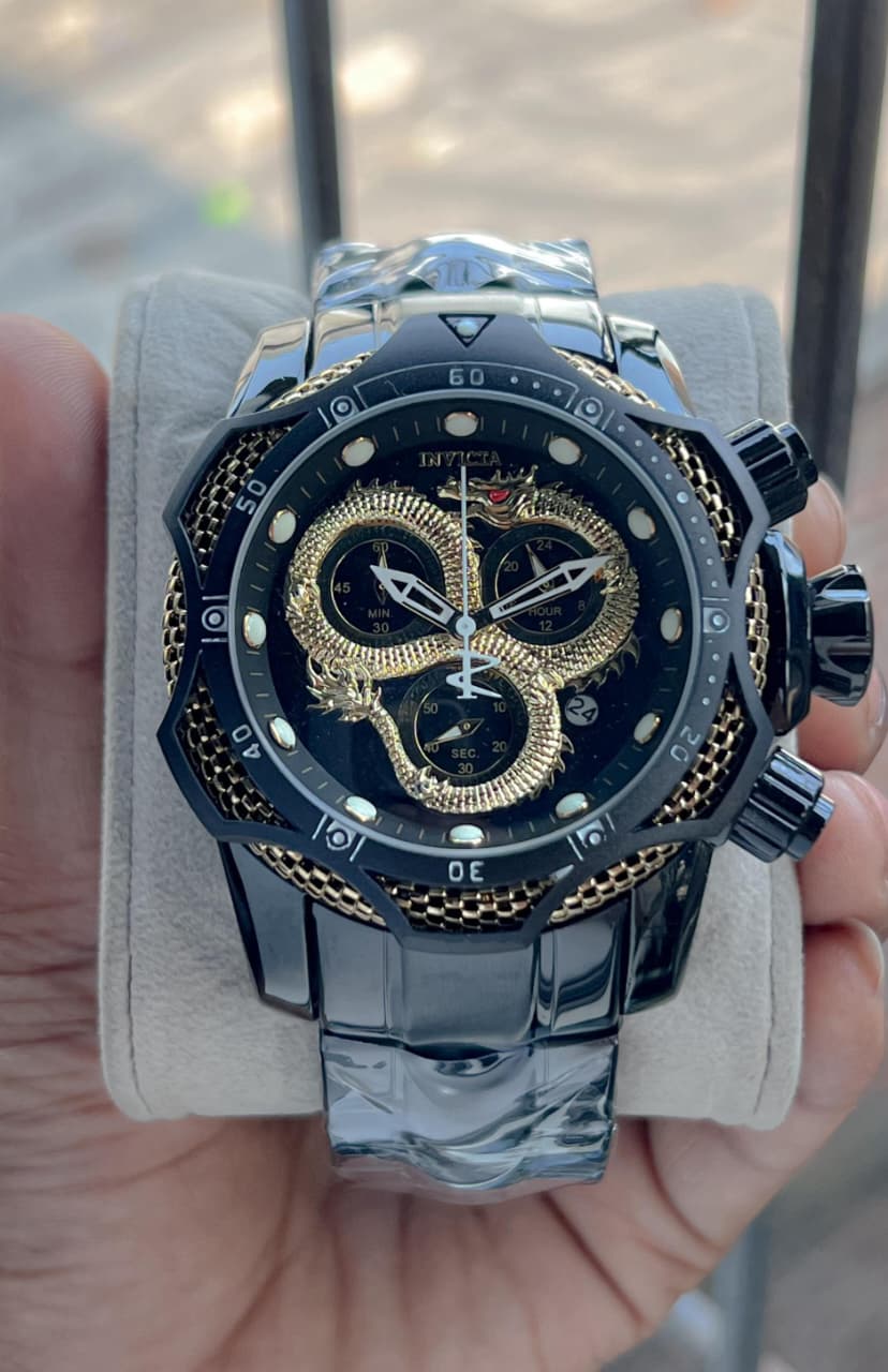 Invicta venome luxury chronograph watch, featuring a striking gold dial with a detailed snake design,