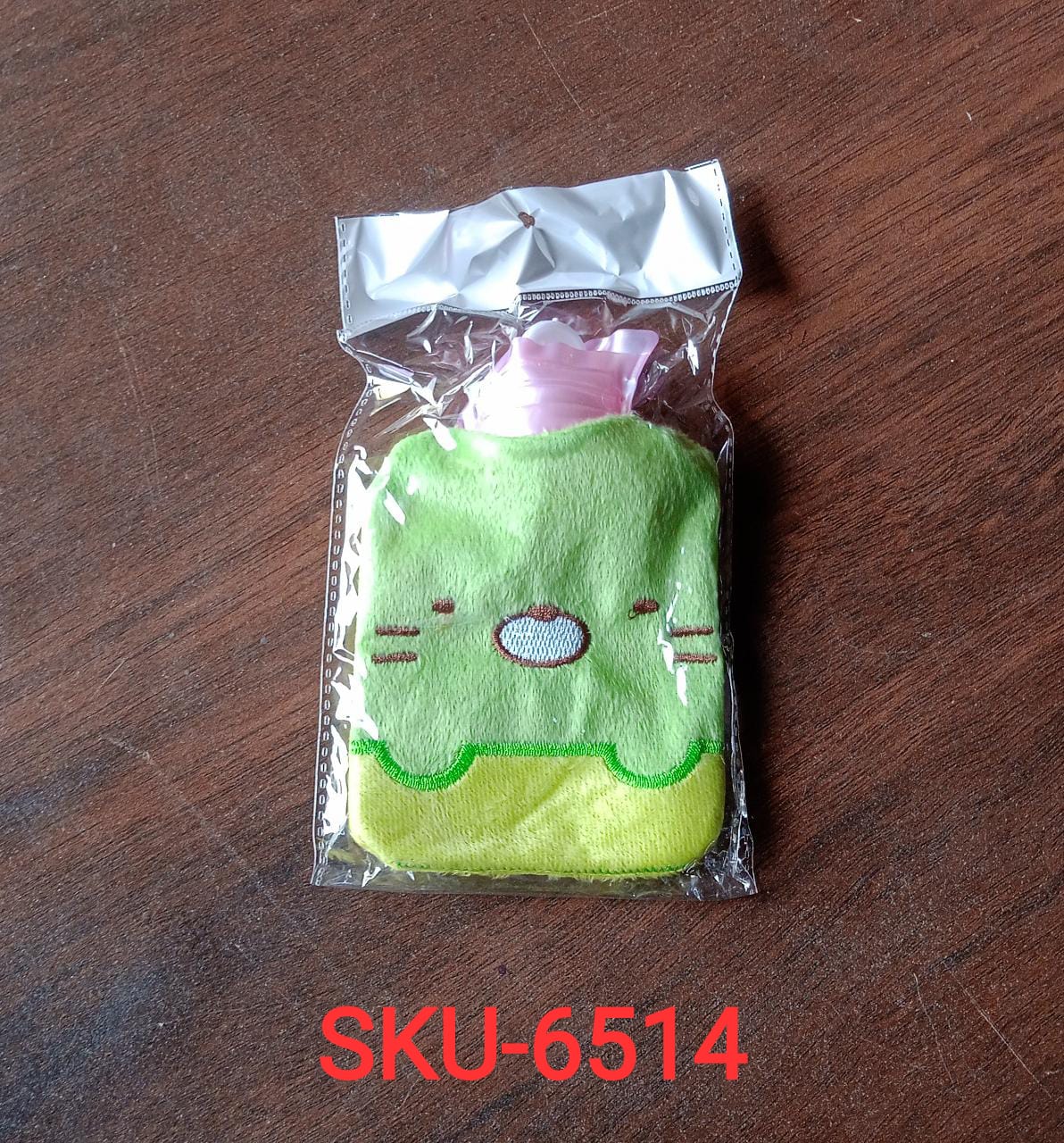 Green Kitty hot water bag for warming and pain relief