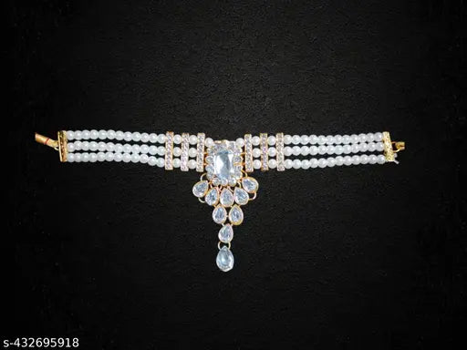 The Stunning Rock combo necklace set with earrings and maang tika