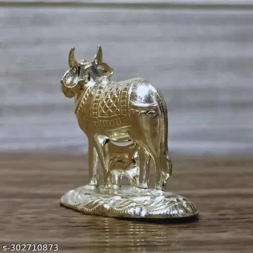 German Silver Kamadhenu Cow And Calf Idol For Pooja / Decor Height : 1.5 Inches Weight : 11 Grams