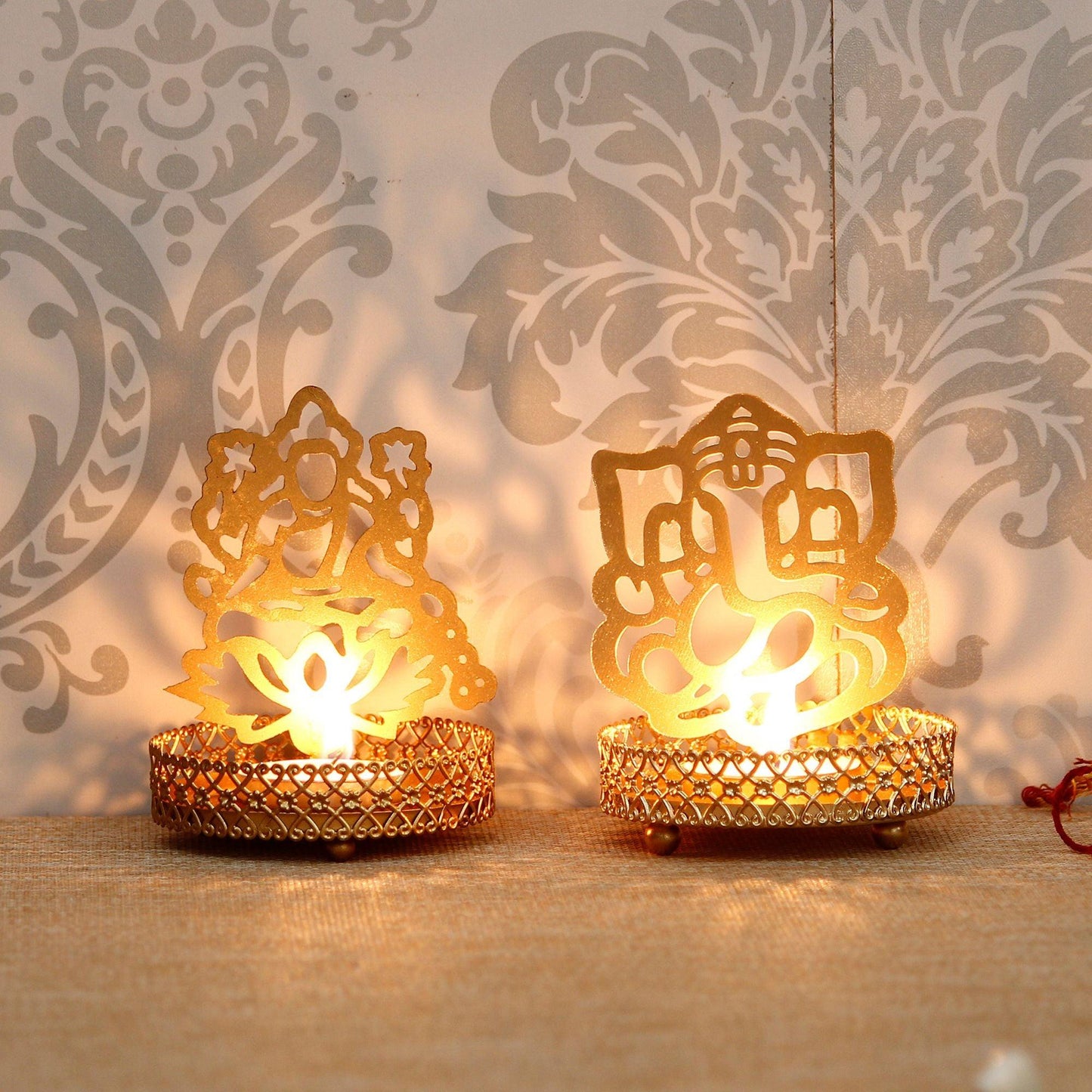 eCraftIndia Lord Ganesha and Laxmi Shadow Tea Light Holder - Springkart 